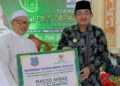 Bupati Anwar Sadat Hadiri Peringatan Haul MT. AL Hidayah Desa Teluk Sialang