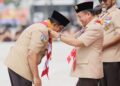 Bupati Anwar Sadat Terima Penghargaan Lencana Melati Pada Peringatan Hari Pramuka Ke-62 Provinsi Jambi
