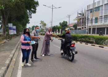 IWO Jambi Bersama RS Erni Medika Bagikan Ribuan Masker Kepada Masyarakat dan Penggunaan Jalan