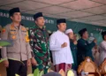 Pakai Sarung, Edi Purwanto Hadiri Apel Hari Santri Nasional di Kabupaten Tebo