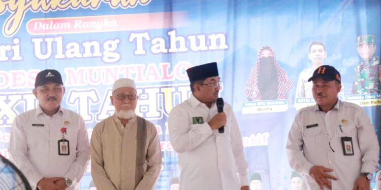 Bupati Tanjabbar Hadiri HUT Ke-XII Desa Muntialo