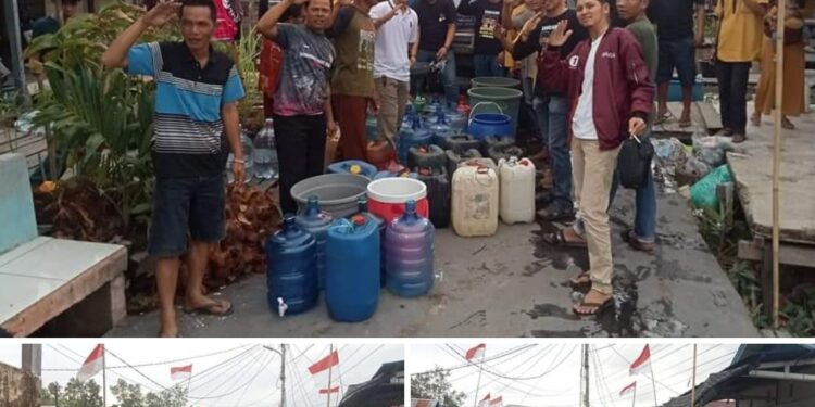 Tim Milenial Bagikan Air Bersih, Warga Bina Karya Nyatakan Siap Menangkan Paslon Hairan-Amin