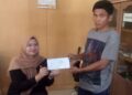Lurah Teluk Dawan Pasang Spanduk RH Viral, Tim Haris-Sani Surati Bawaslu Tanjab Timur