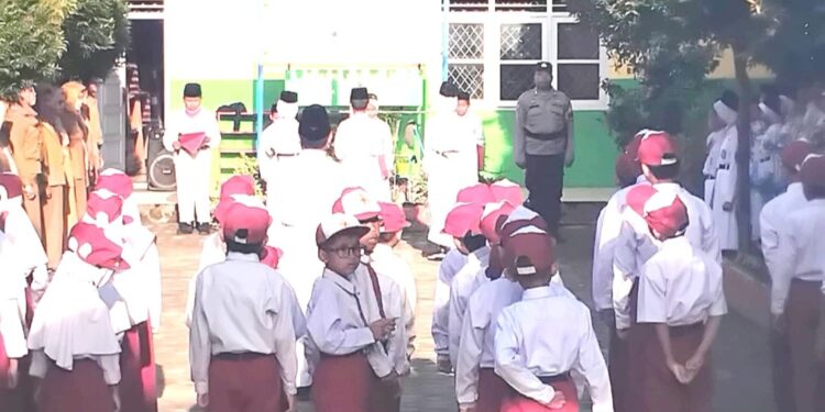 Bhabinkamtibmas Thehok Jadi IRUP di SDN 114 Kebun Kopi