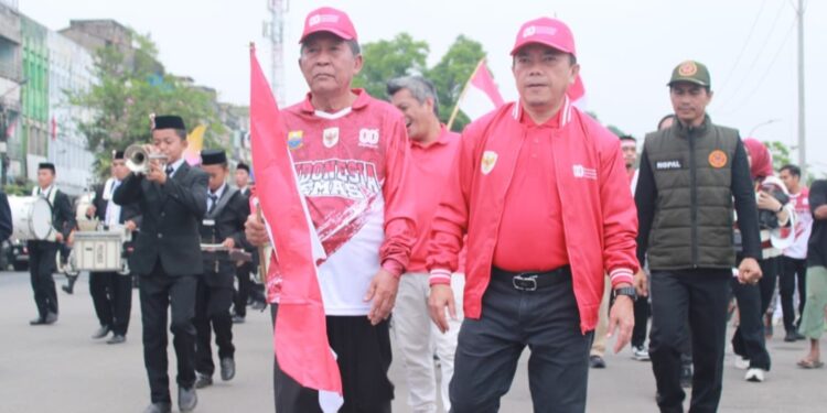 Sejarah Baru! Gubernur Al Haris Raih Rekor MURI Lewat Pengibaran Ribuan Merah Putih di Jembatan Gentala Arasy