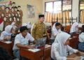 Evaluasi Kualitas Siswa,Gubernur Al Haris Tinjau Pelaksanaan TKA di SMAN 8 dan SMKN 1 Kota Jambi