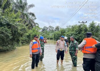 Hujan Deras Melanda Merlung, Polisi Siagakan Personel di Titik Rawan Banjir