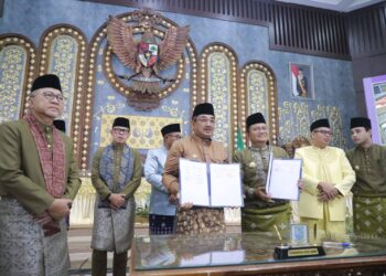 Kolaborasi untuk Kemajuan Jambi, Anwar Sadat Hadiri Penandatanganan MoU Lintas Daerah